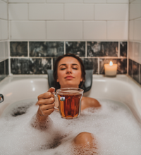 woman in tub with avocado tea